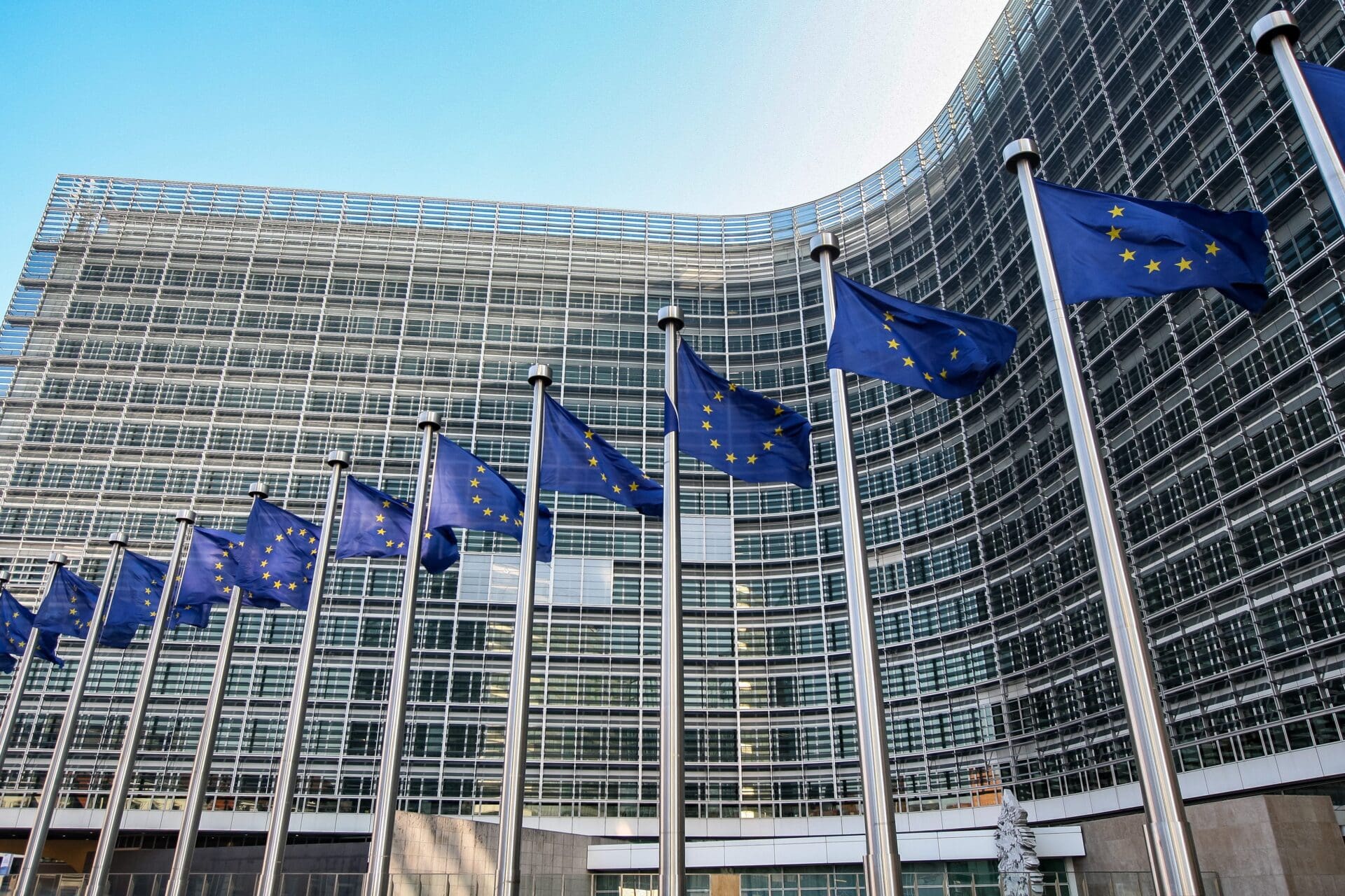 European flags on the background of the European Parliament.