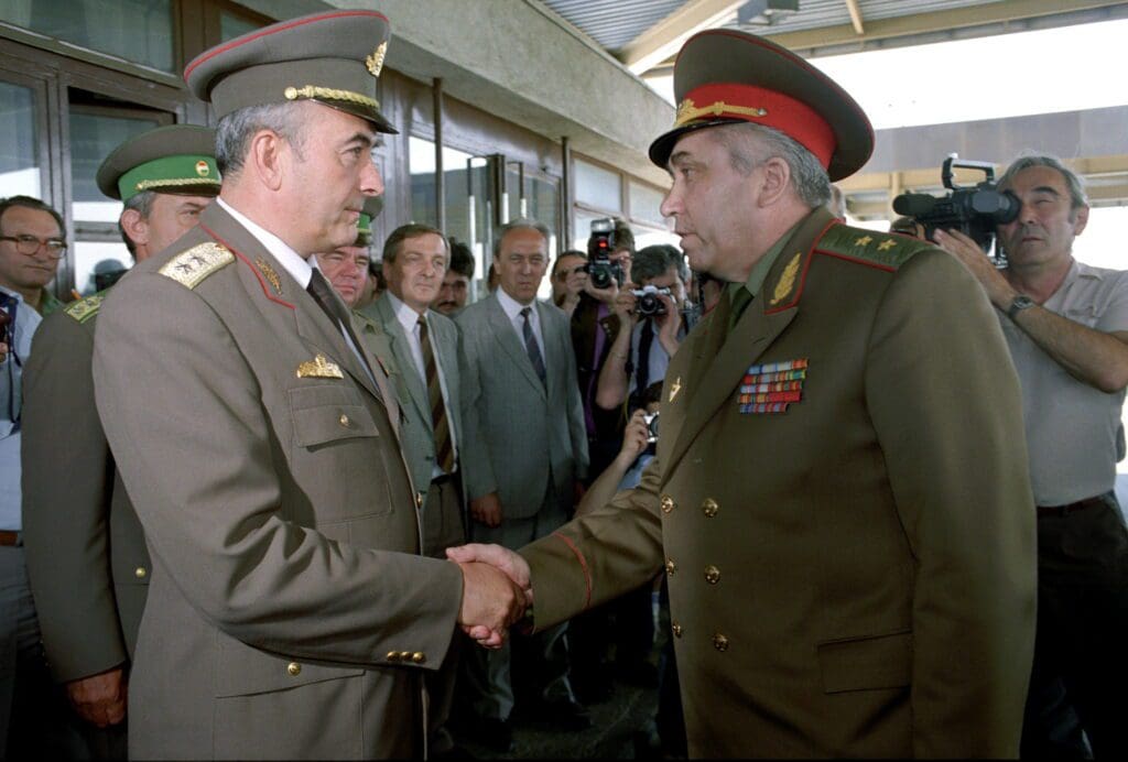 Hungarian Lt General Antal Annus (L) shakes hands with Lt General Viktor Shilov before the Soviet Commander of Southern Group of Forces leaves Hungary on 19 June 1991.