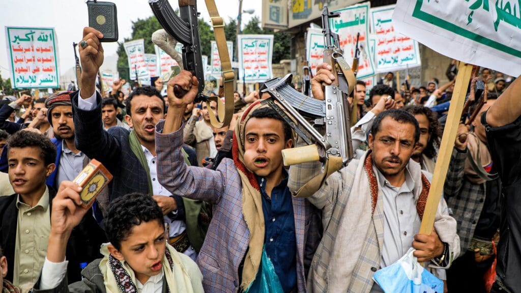Demonstrators march in a rally denouncing the burning of the Qur'an, Islam's holy book, in Sweden in Yemen's Huthi-held capital Sanaa on 24 July 2023.