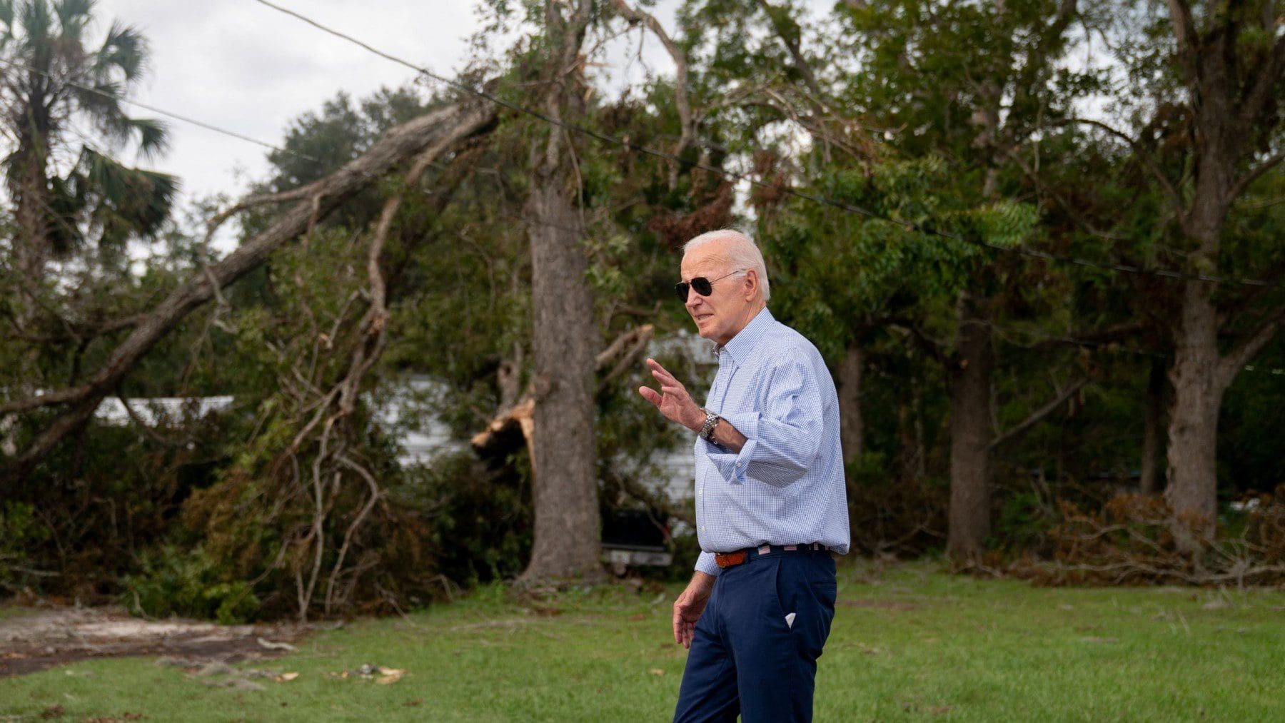 US President Joe Biden walks to speak to residents impacted by Hurricane Idalia, in Live Oak, Florida, on September 2, 2023.