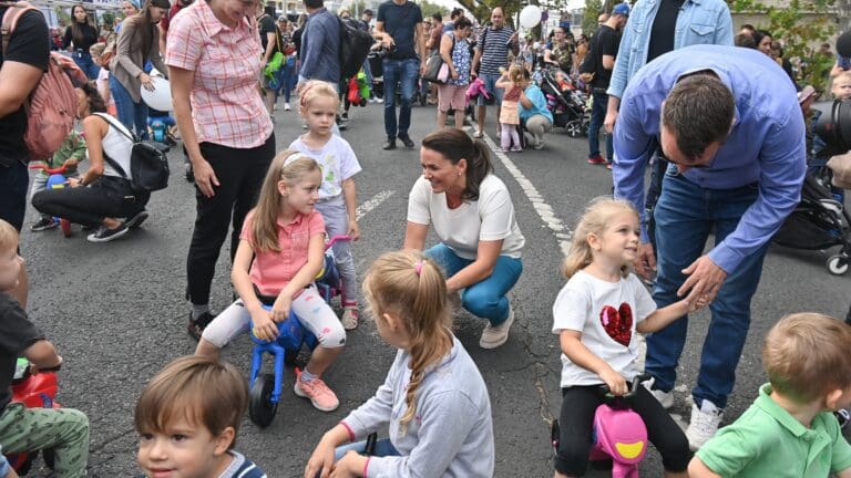 President Katalin Novák with children in Budapest’s City Park at a fringe event of the 5th Budapest Demographic Summit on 16 September 2023.