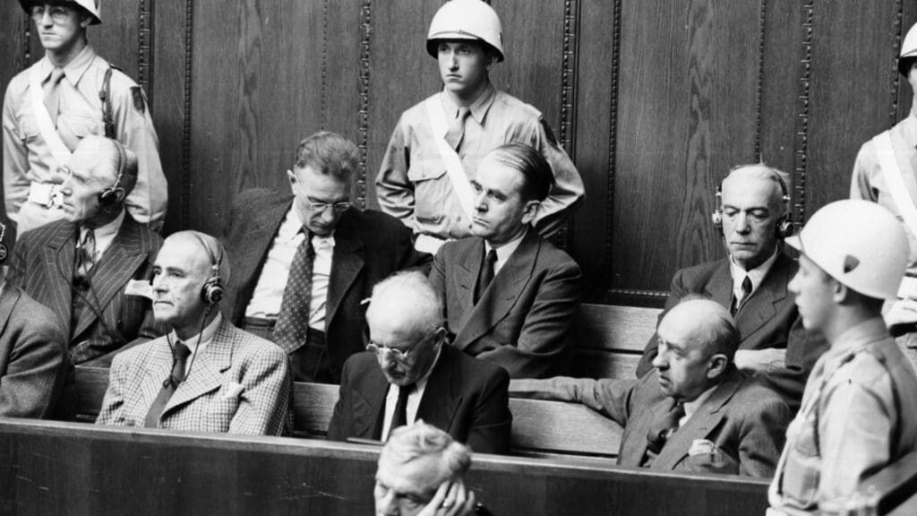 Franz von Papen as a defendant at the Nurenberg trials (back row, first from left, 1945 or 1946). Von Papen was acquitted, and released.
