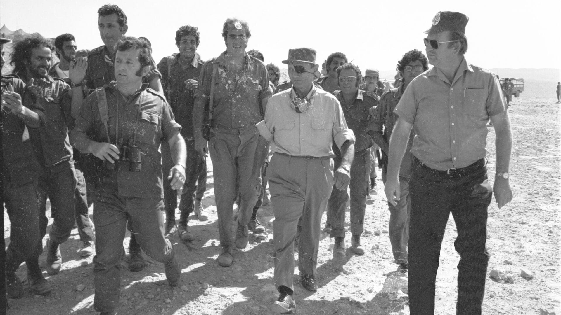 Israeli Defence Minister Moshe Dayan (C) during the Yom Kippur War in 1973.