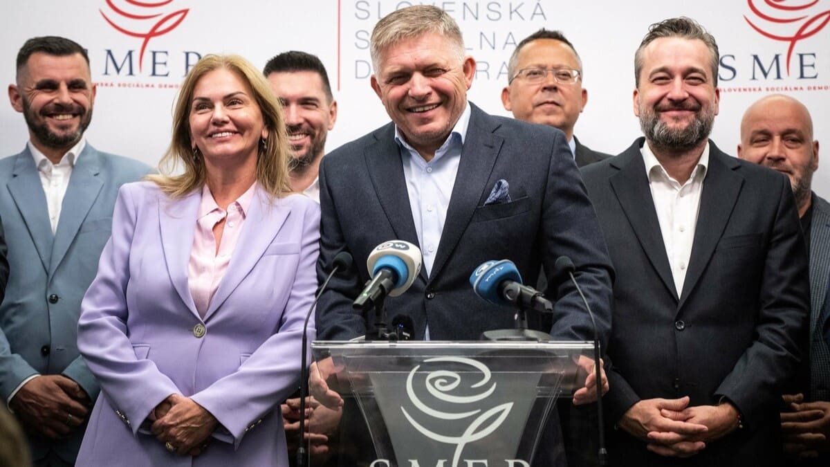 Chairman of Smer-Social Democracy party Robert Fico (C) smiles as he addresses a press conference at the party's headquarters after an early parliamentary election in Bratislava, Slovakia on October 1, 2023.