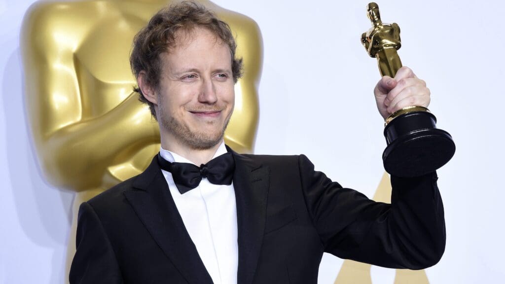 Son of Saul director László Nemes Jeles with the Oscar statuette on 29 February 2016 in Los Angeles.