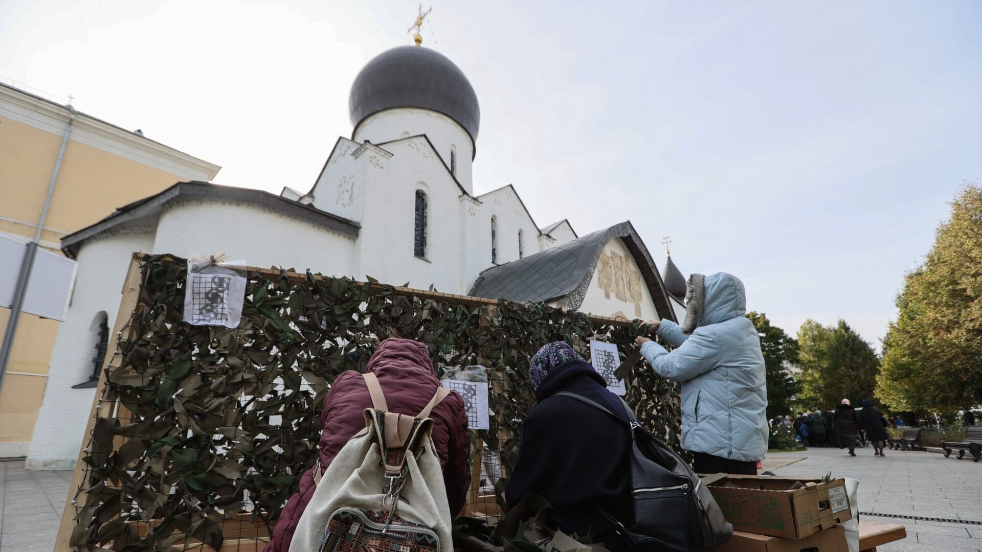 Muscovites making camouflage nets for the Russian military on the grounds of the Martha and Mary Convent in central Moscow on 11 October 2023.