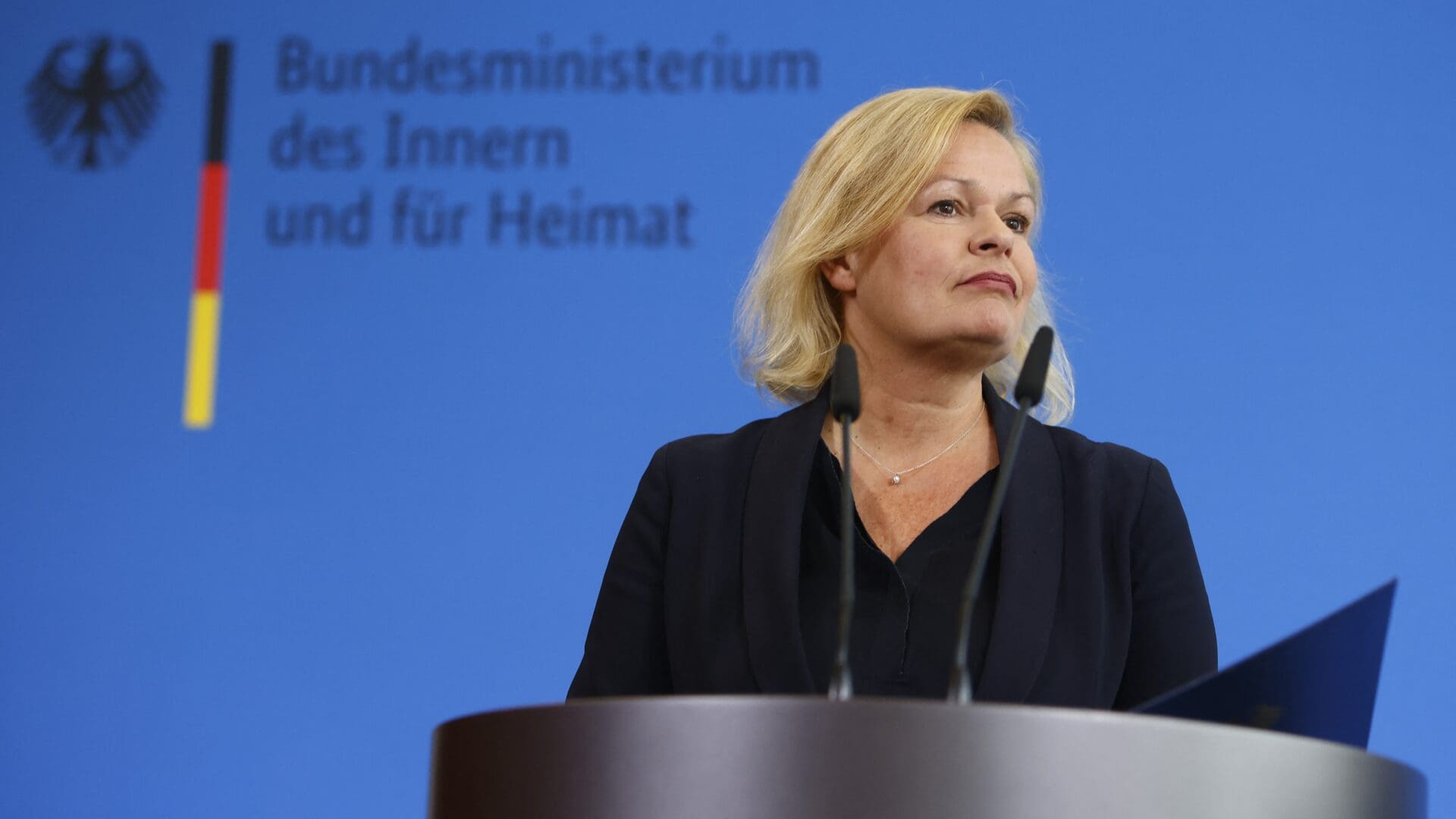 German Interior Minister Nancy Faeser looks on as she gives a press statement on a new bill to facilitate migrant deportation in Berlin on 25 October 2023.