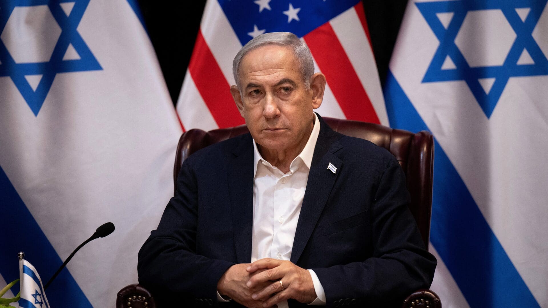 Prime Minister Benjamin Netanyahu waits for the start of the Israeli war cabinet meeting, also attended by the US President, in Tel Aviv on 18 October 2023.