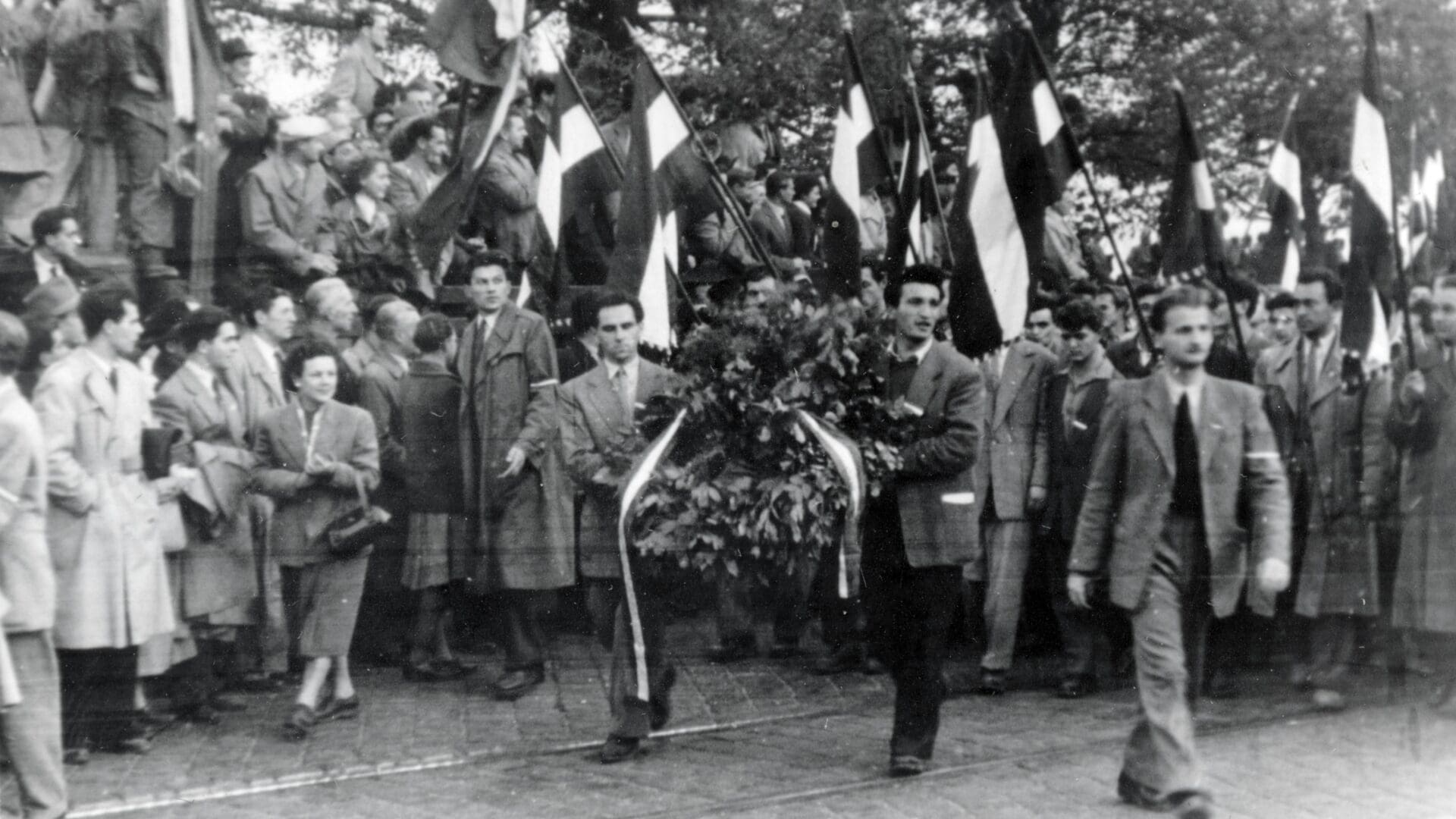 Technical University students marching for freedom arrive at the Bem statue in Budapest on 23 October 1956.