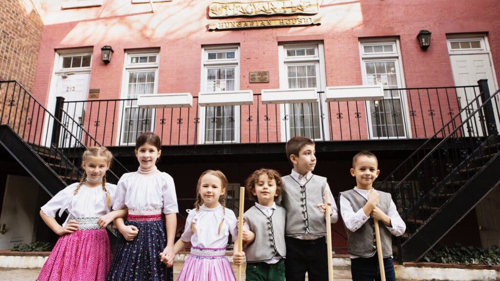 Hungarian American children posing outside the Hungarian House.