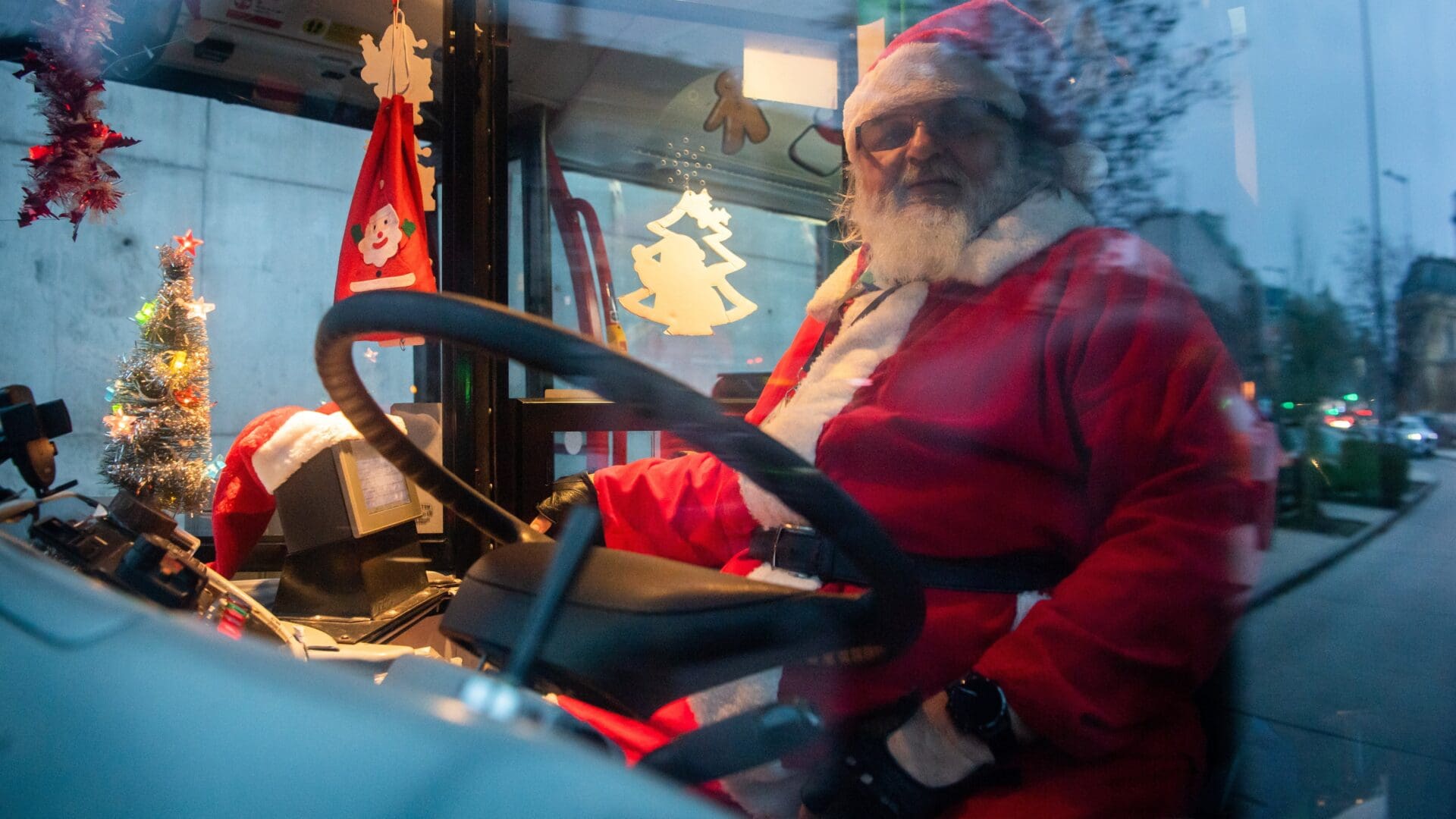 A Budapest bus driver dressed as Mikulás in one of the traditional Mikulás Buses on 4 December 2022.