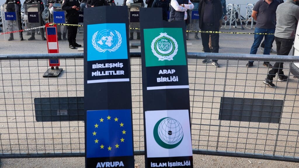 Two symbolic coffins, with the flags of Europe and the United Nations (L) and with the flags of the Arab League and the Organisation of Islamic Cooperation (R), left by demonstrators during a protest against US Secretary of State Antony Blinken's visit to Turkey in Ankara on 6 November 2023.