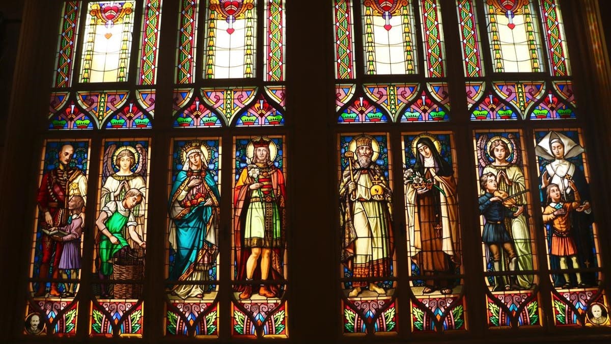 Stained glass window depicting famous Christian and Hungarian figures in the Nádor Hall of the National Institute for the Blind, Budapest. This piece of art is considered to be the largest stained-glass composition in Hungary.