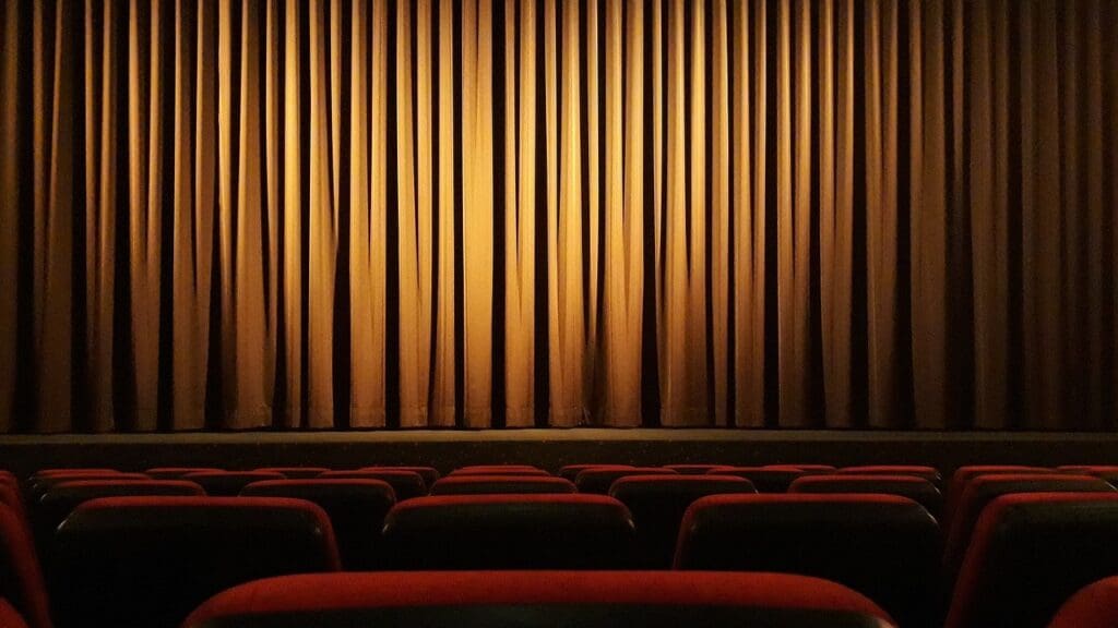 Cinema screen with the curtain lowered (Illustration)