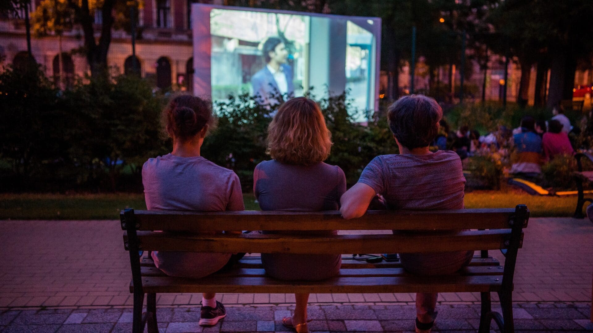 Young people watch a Hungarian film at a free-of-charge outdoor film screening in Hunyadi Square in Budapest on 4 July 2020.