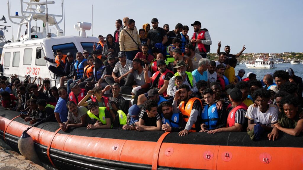 Migrants arrive in the harbour of Italian island of Lampedusa, on 18 September 2023