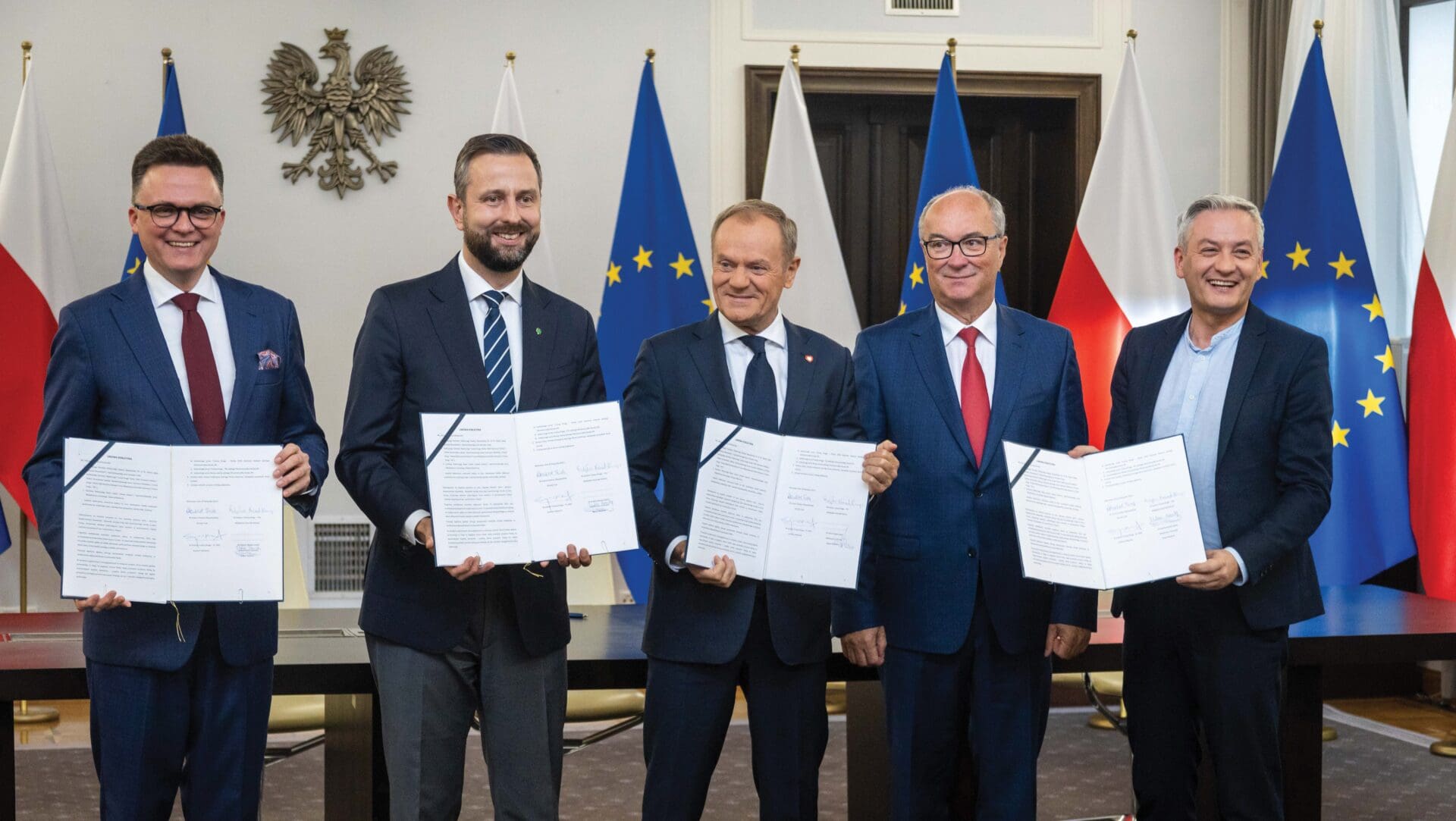 Leaders of the three opposition parties after signing the coalition agreement