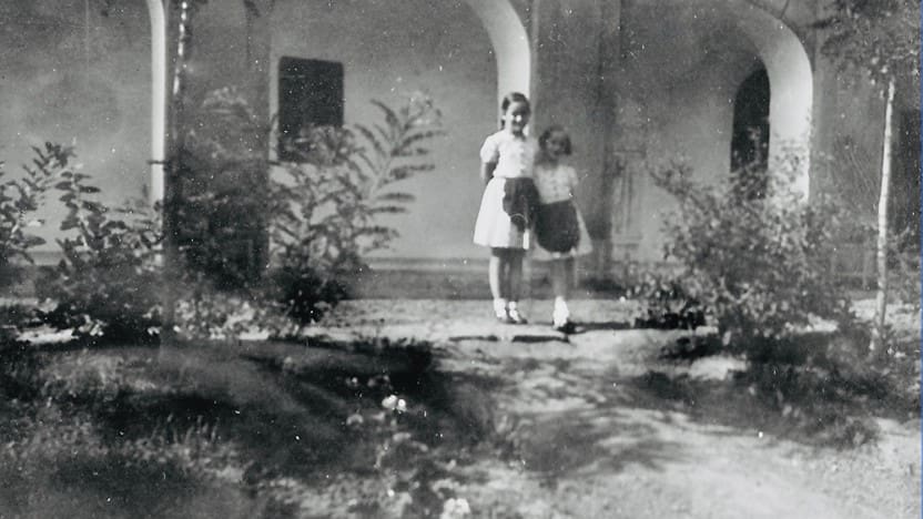 Archival photo of Eva Kohner as a child and a sibling or friend.