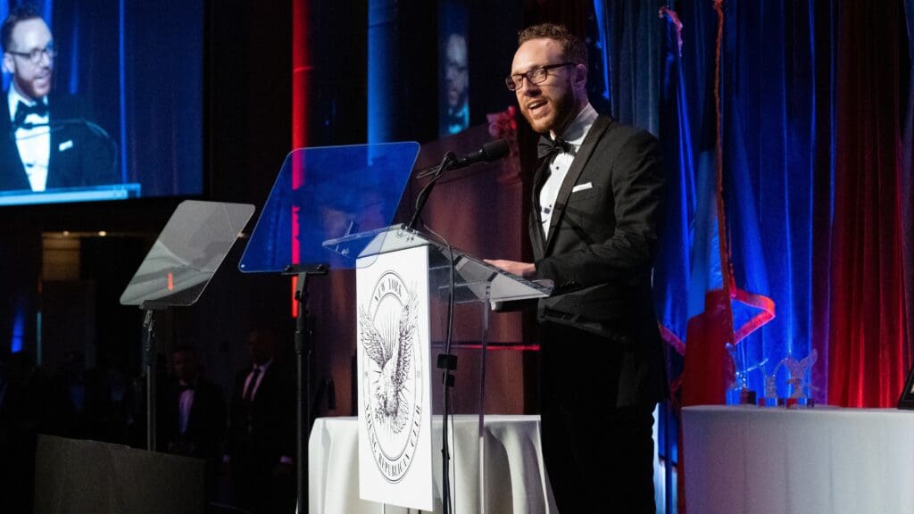Nathan Berger speaks at the NYYRC’s annual gala in December 2023.