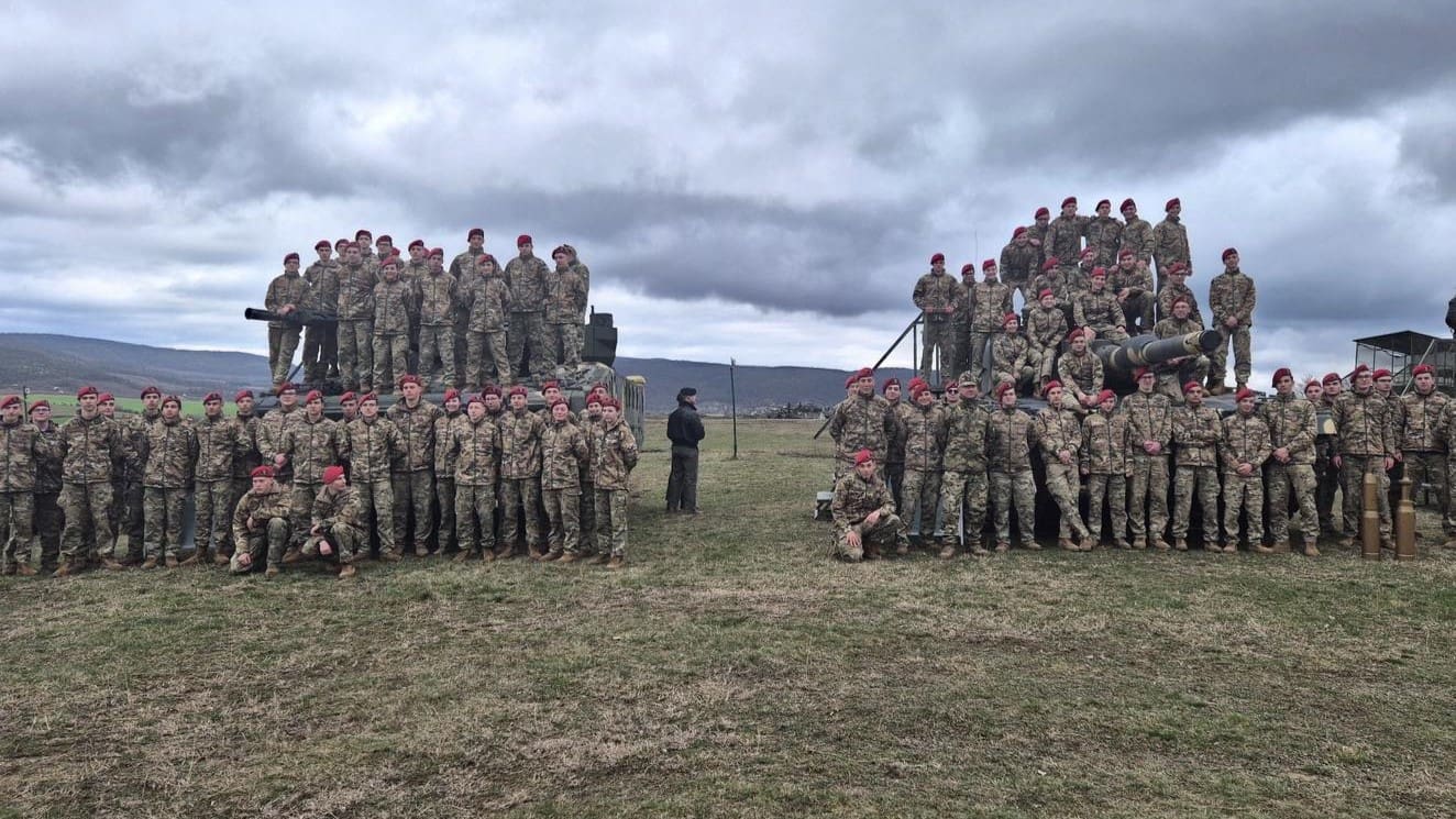 Cadets of the Kratochvil Károly Military Secondary School at the Szomód shooting range observing the shooting exercise of the NATO Forward Land Force Battlegroup on 13 March 2024.