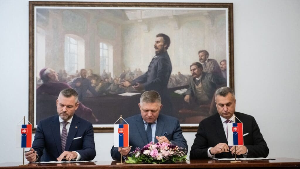 Chairman of the ‘Voice’ (Hlas) political party Peter Pellegrini, Chairman of the social democratic Smer party Robert Fico and Chairman of the the National Party (SNS) Andrej Danko sign a Memorandum of Understanding to form a coalition government at the National Council building in Bratislava, Slovakia on 11 October 2023.
