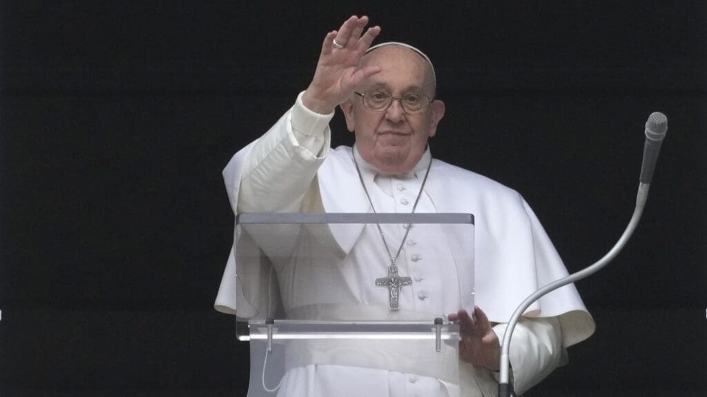 Pope Francis recites the Angelus prayer from the window of his Vatican City suite looking onto St Peter’s Square in Rome on 10 March 2024.