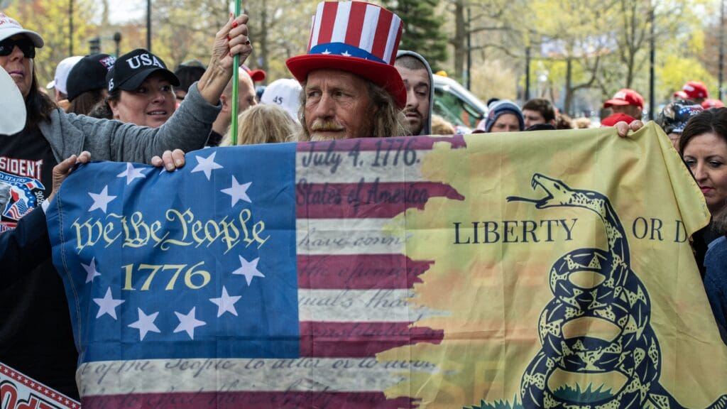 Trump supporters wait in line at a Make America Great Again Rally where he is scheduled to speak in Manchester, New Hampshire on 27 April 2023.