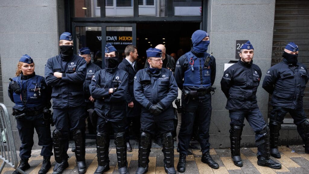Belgian Police block the entrance of the Claridge events centre in Brussels, the venue of the National Conservatism Conference on 16 April 2024.