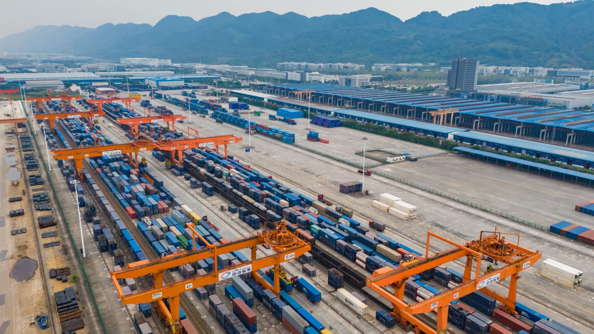 An aerial photo shows the West Land Sea New Channel train waiting to depart from the railway Container Centre station in Chongqing, China, 22 October 2023.