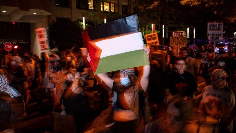 Pro-Palestinian demonstrators march back to George Washington University's University Yard on 7 May 2024 in Washington, DC. (Getty/AFP)