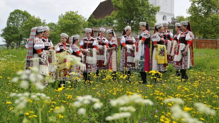 Girls dressed in traditional folk costumes on Pentecost Sunday in Kalotaszeg, Transylvania