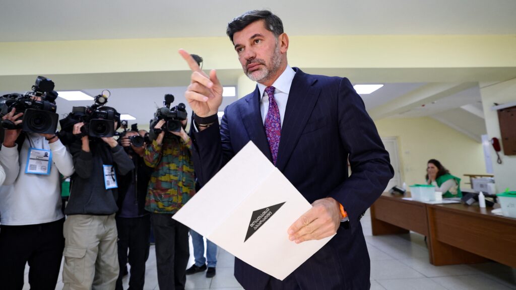 Tbilisi Mayor Kakha Kaladze votes in local elections at a polling station in Tbilisi on October 4, 2025. (Photo by Giorgi ARJEVANIDZE / AFP)