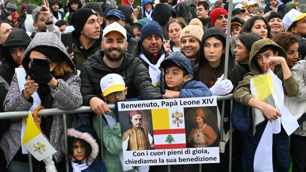 People wait for the arrival of Pope Leo XIV before his visit to the tomb of Saint Charbel Makhlouf at the Saint Maron monastery in the mountainous village of Annaya on December 1, 2025.