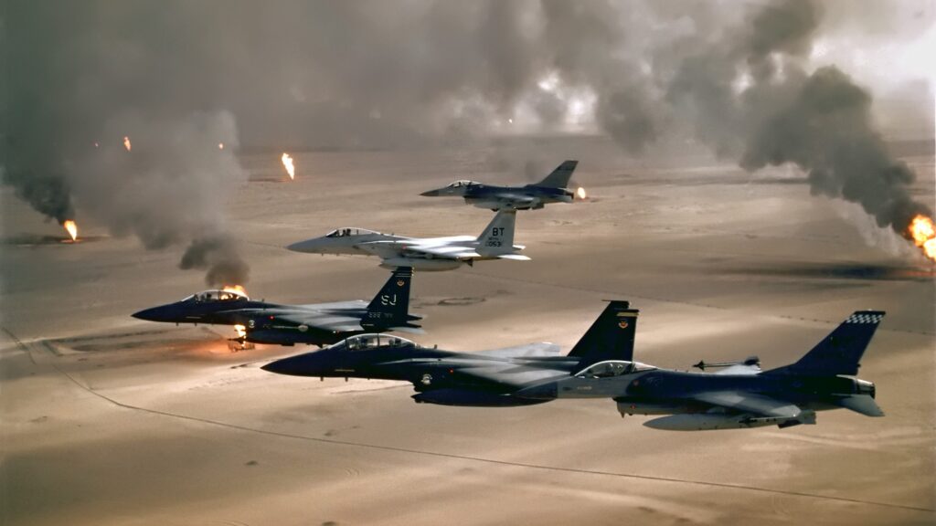 More details USAF aircraft of the 4th Fighter Wing (F-16, F-15C and F-15E) fly over Kuwaiti oil fires, set by the retreating Iraqi army during Operation Desert Storm in 1991.