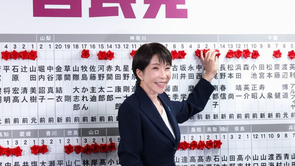 apan's Prime Minister Sanae Takaichi, leader of the ruling Liberal Democratic Party (LDP), places a red paper rose on the name of an elected candidate at the LDP headquarters on general election day in Tokyo, Japan, February 8, 2026.