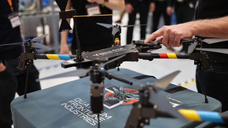 A drone is decorated in the colors of Ukraine and Germany, pictured during a visit of the Ukrainian President and the German Defence Minister at the production facility of drone producing company Quantum Frontline Industries (QFI) in Gilching near Munich, southern Germany, on the sidelines of the 62nd Munich Security Conference (MSC) on February 13, 2026.
